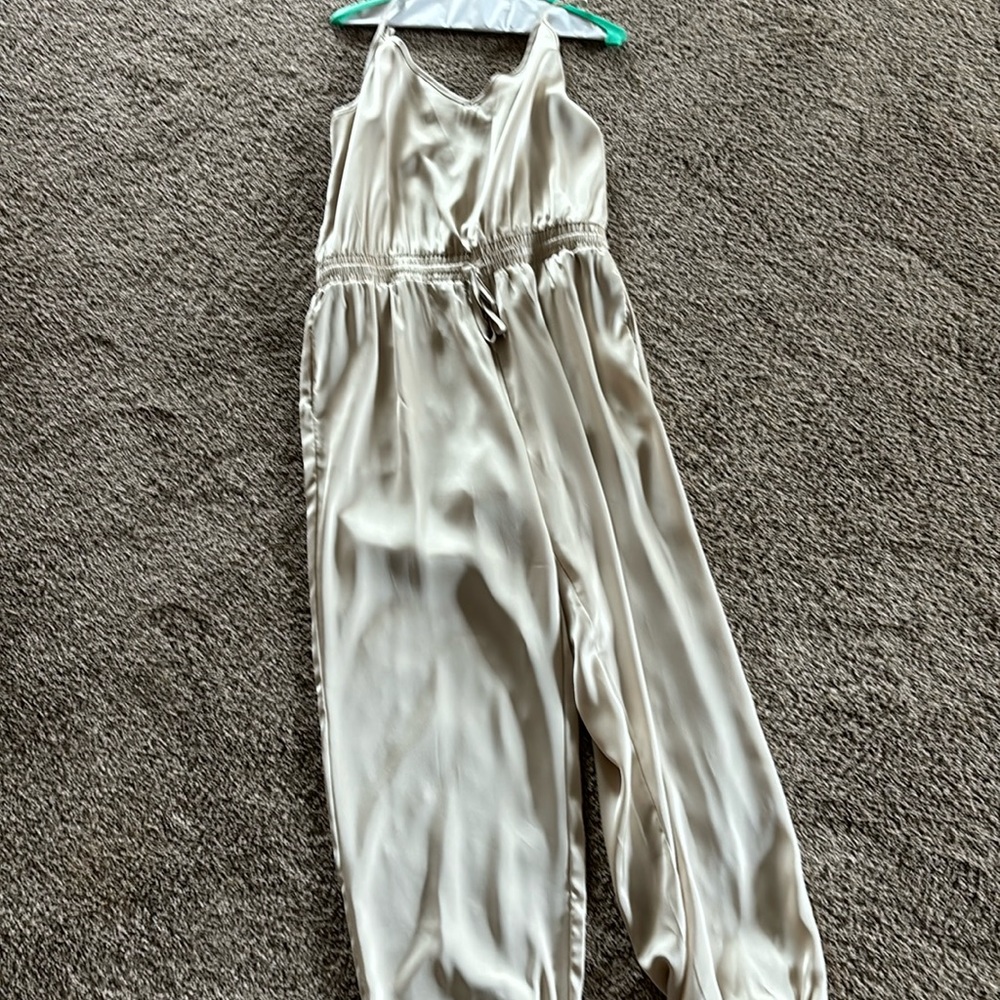Size large spaghetti strap jumpsuit. In excellent